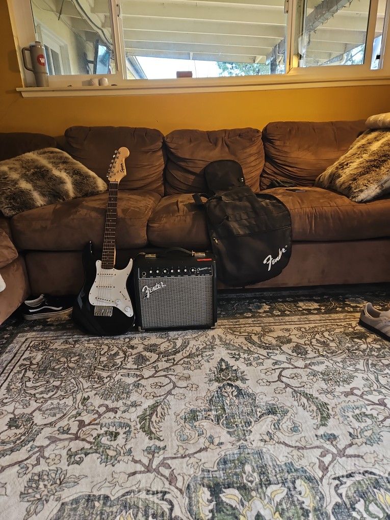 Squier Mini Guitar And Fender Champion 20 Amplifier With Fender Guiter Bag
