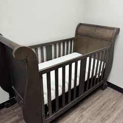 Brown wood Crib