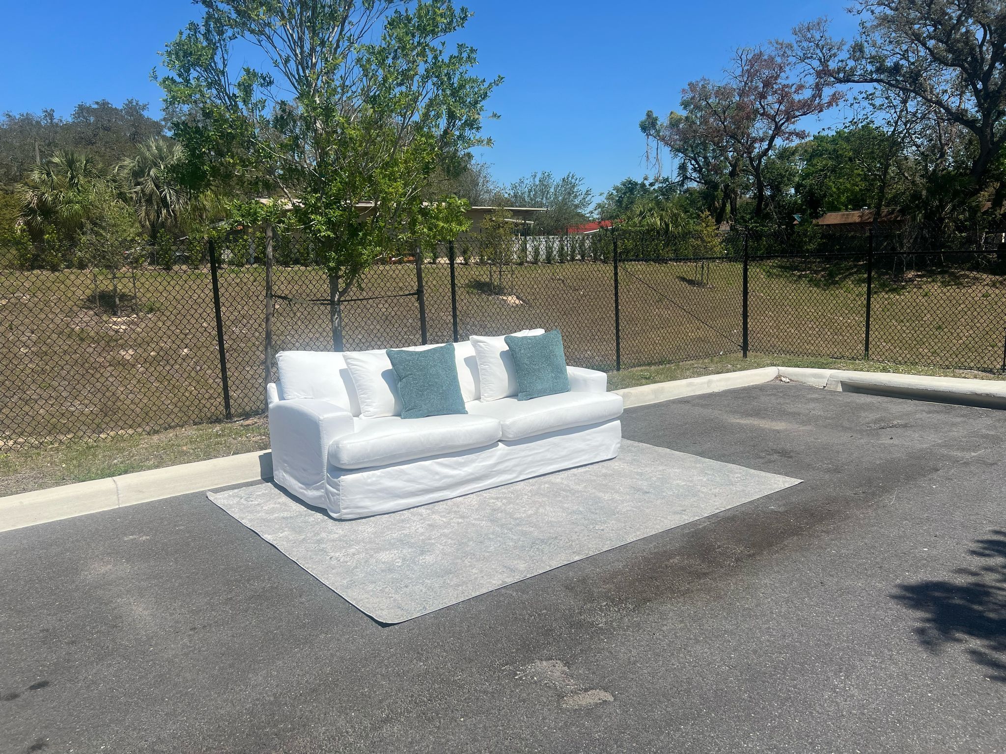 City furniture white slip covered couch