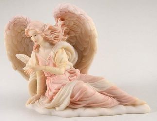 This is a Seraphim Classics Evangeline "Angel of Mercy" figurine by Roman, Inc
