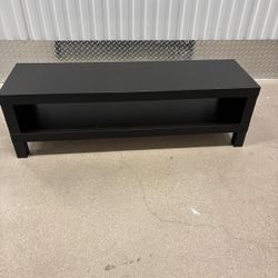 Chocolate brown TV stand 48 inches wide , 14 inches depth and 14 inches high $40