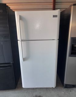 White Frigidaire Refrigerator And Freezer