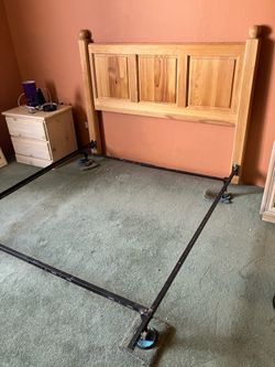 Solid wood Queen size bed Headboard. includes metal frame rails.