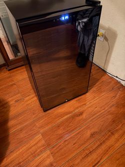 Wine fridge practically new firm on price