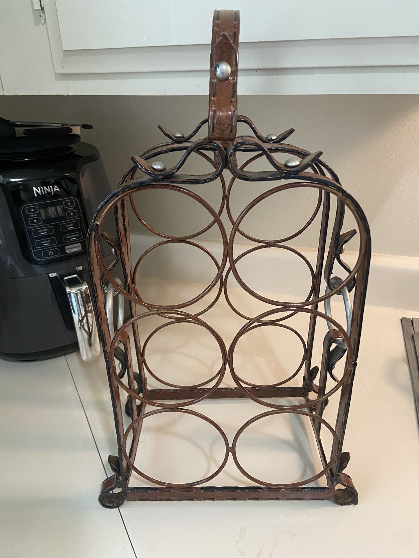 Freestanding Wrought Iron Vintage Stiched Leather Themed Wine Rack holds 6 bottles