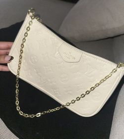 Easy Pouch On Strap handbag in Monogram Empreinte leather