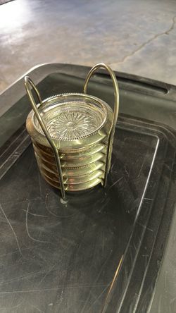 Glass and silver sunburst six piece coaster set