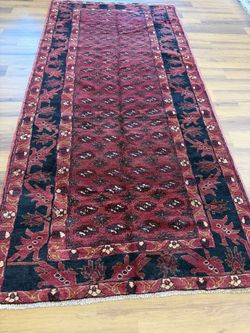 Hand knotted wool rug