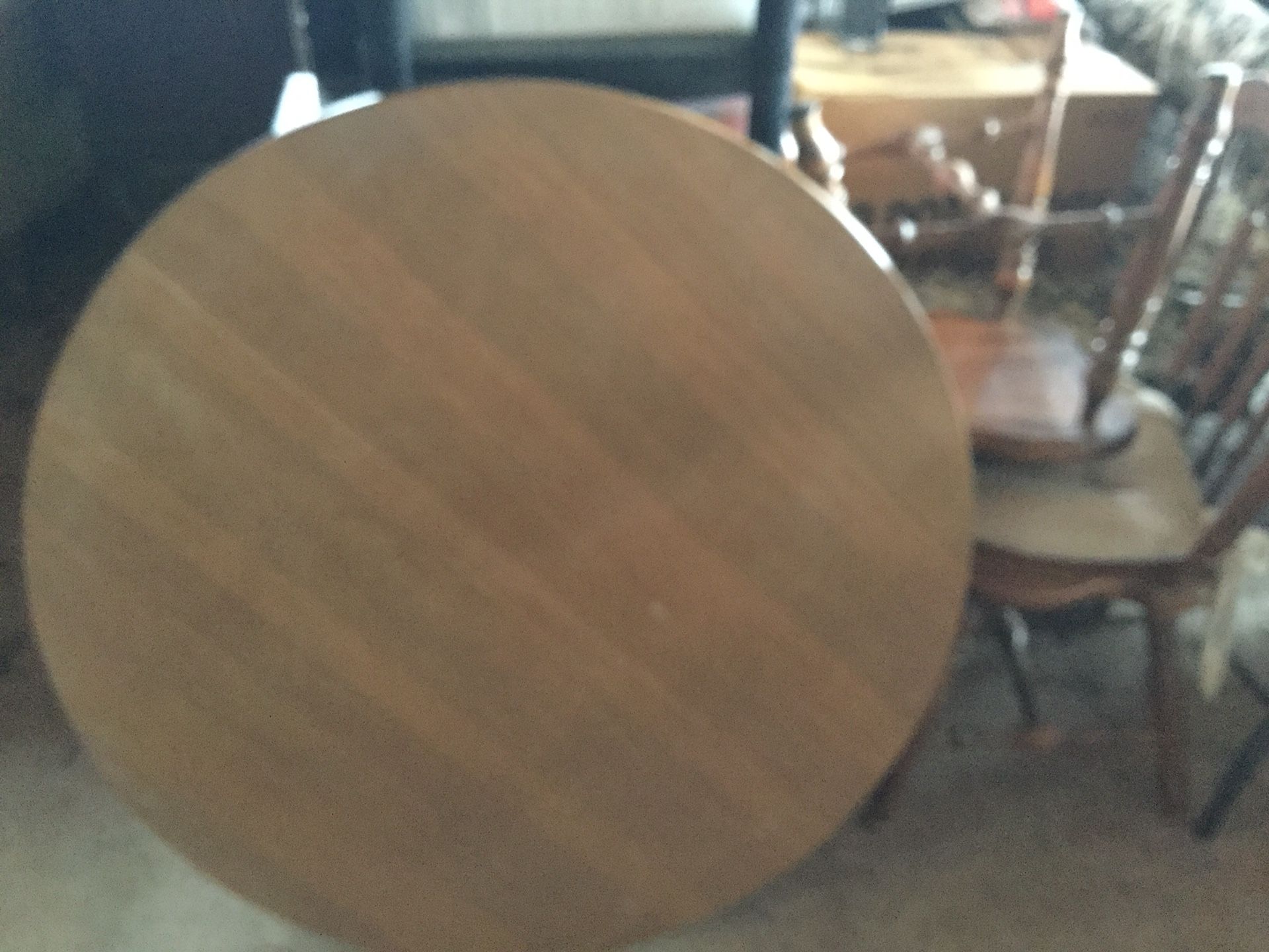 Older kitchen table with leaf and four chairs