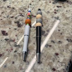 Decorated Pens.