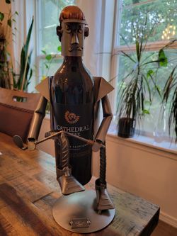 H & K Metal Sculptures Wine Holder -- Golfer Breaking A Club Over His Knee