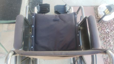 3 Different wheelchair. 1 NEW  , Lightweight, Someback pouch &Sturdy foot pads to stand on in the back & To Eliminate Wheelchair To Fall Back & You