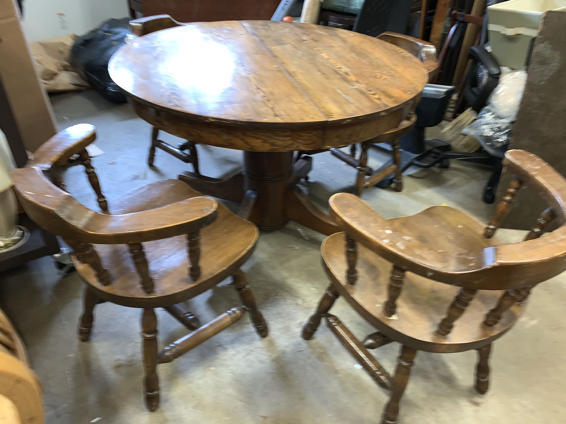 Solid vintage wooden round table with chairs