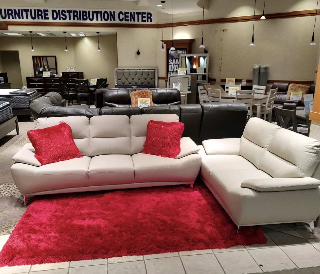Fourth of July sale. Valencia cream colored sofa and loveseat set now $699. Easy finance option. Same day delivery.
