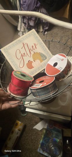 Decor basket and 3 rolls of wired ribbon $5