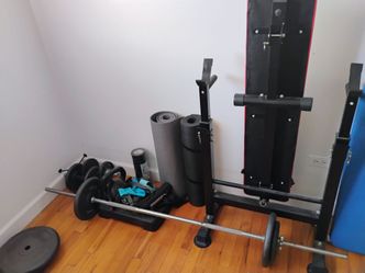 Steel weights and a fold up weight bench