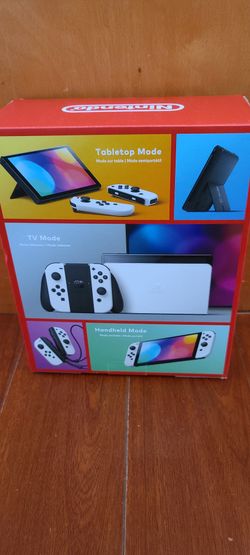 Nintendo Switch – OLED Model w/ White Joy-Con