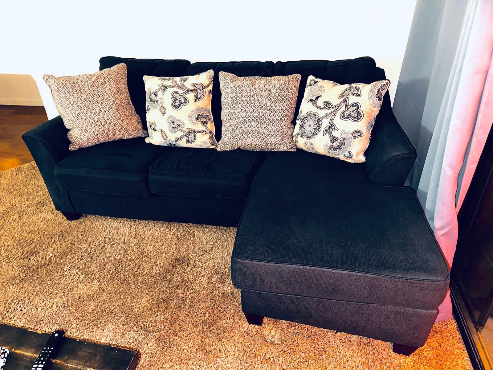 Nice Sectional Sofa with chaise lounge. Blue color in perfect condition. I can deliver for an additional cost.The price is $150, there are no scratche