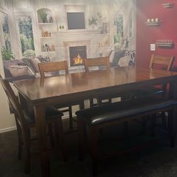 Wood Table seats 6-7