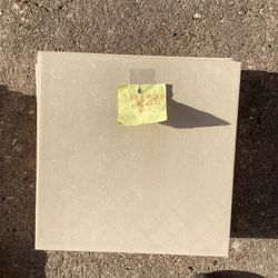 13 Pieces Porcelain Tile. Dimensions are 11-3/4” X11-3/4.