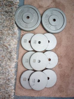 1" standard weight plates excellent condition, 2 x 25lb weight plates, 9 x 10lb weight plates.