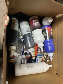 Lots used art paints and brushes