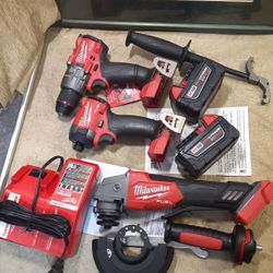 NEW MILWAUKEE M18 FUEL GENERATION 4 DRILLS KIT AND GRINDER 