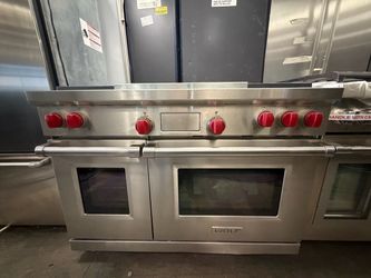 48” Wolf Range Dual fuel with griddle and Four burners