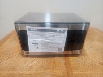 GE 1.1 Cu. Ft. Countertop Microwave Oven