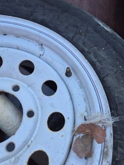Trailer tires with https://offerup.com/redirect/?o=cmltLk9uZQ== tire is not good.The other tire is good.Just missing the stem to put air