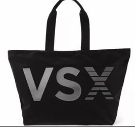 VSX LOGO TOTE BAG by VICTORIAS SECRET SPORT NEW W TAGS  25"L 14"H 5"W inside pocket zip shut top polyurethane coating 100% polyester slinky shiny feel