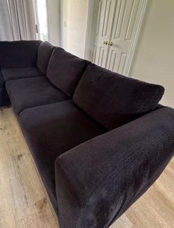 Dark navy L-shaped sectional sofa