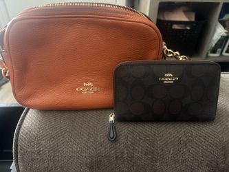 Woman’s Coach Brand crossbody bag and wallet