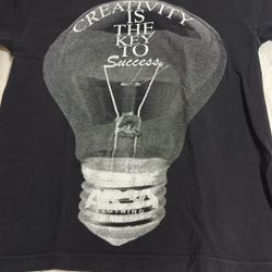 Creativity Black T-shirt Size Medium, Gently Used. 