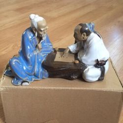 Chinese men playing chess