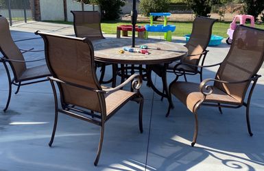 Table And Chairs. Umbrella Not Included