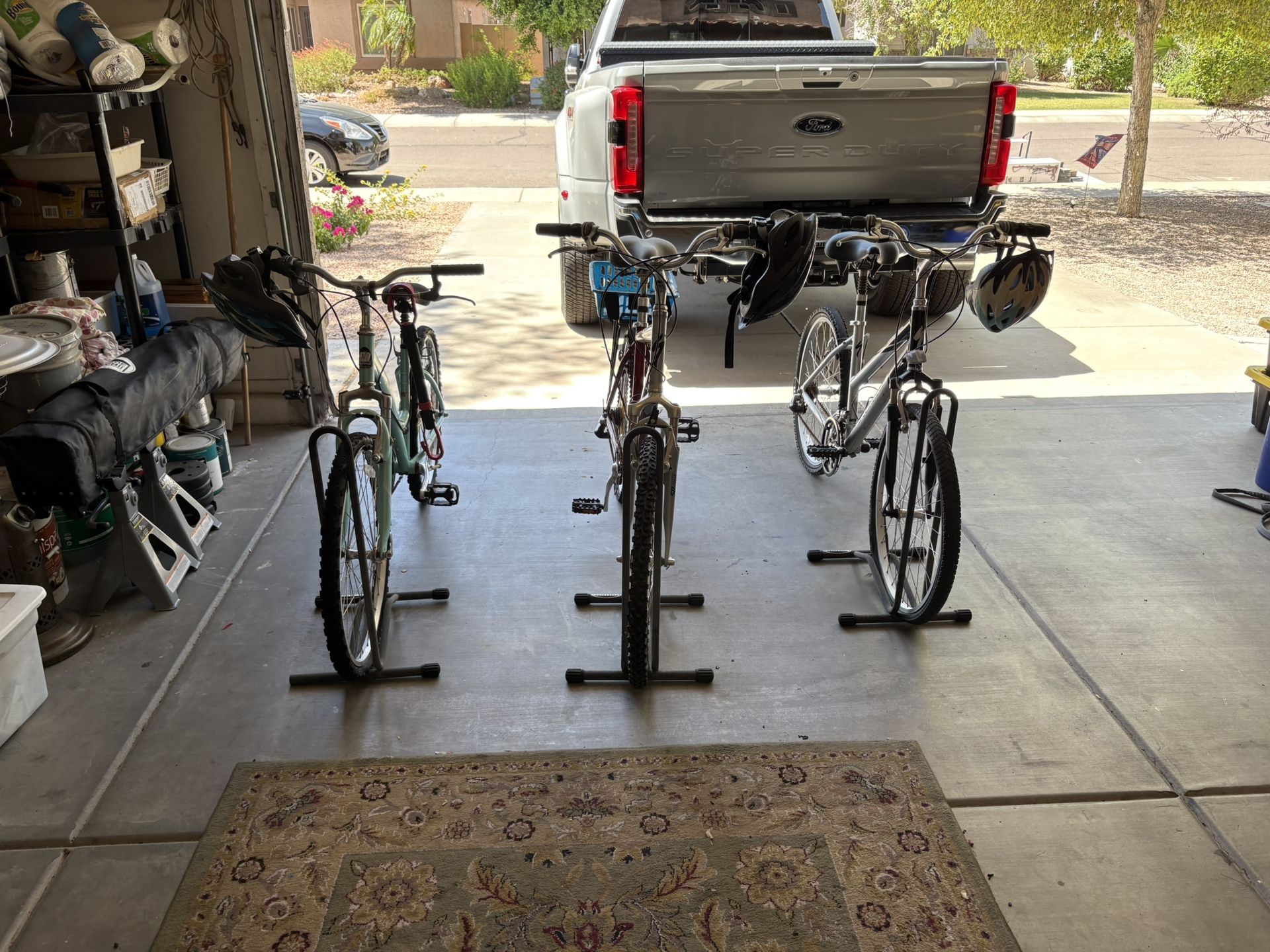 Three Bicycles With Parking Stands
