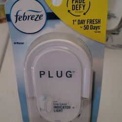 Febreze Plug in Air Freshener, Odor-Fighting Scented Oil Warmer Device (1 Count) For $2.50