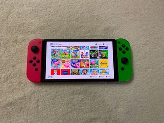 Nintendo Switch OLED and 7500 Games