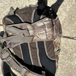 Army camouflage backpack And Black Duffel Bag