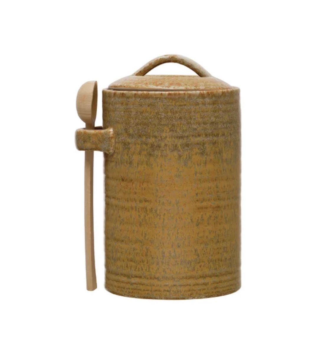 {ONE} Stoneware 24 qt. Kitchen canister. Overall: 7.25” H x 4.5” W x 4.5” D. Color: mustered. MSRP: $37. Our price: $24 + Sales tax