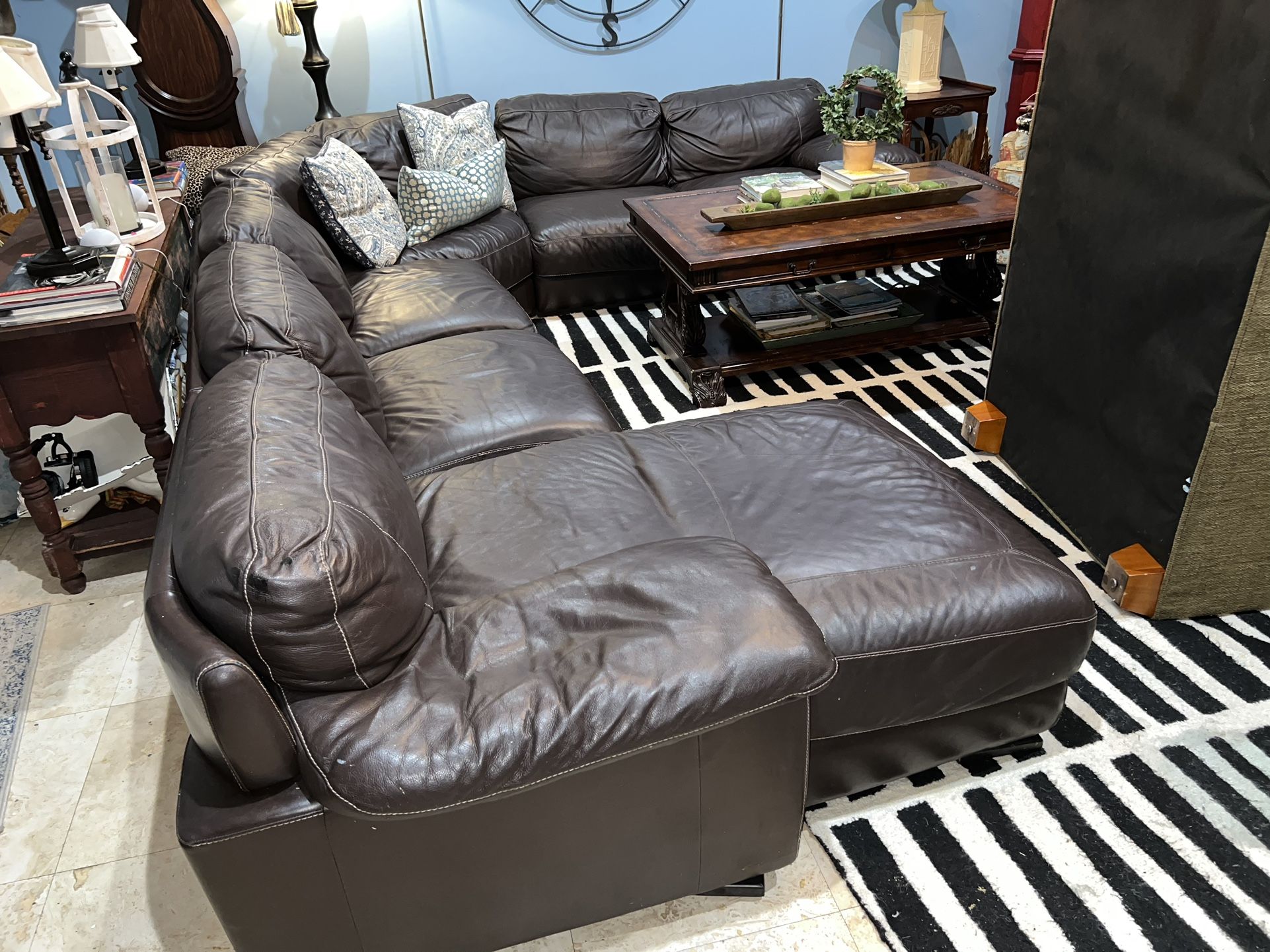 Cindy crawford leather sectional sale rooms to go