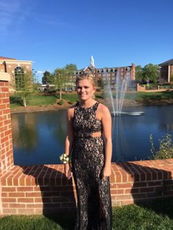 Prom Dress - worn 4 hours! Size 2Petite. Beautiful black lace over beige. Cut outs on sides and back. Has been professionally shortened to fit 5'