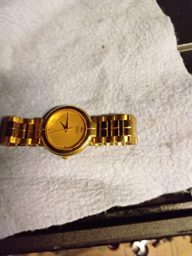 vintage Seiko men's gold-tone analog watch