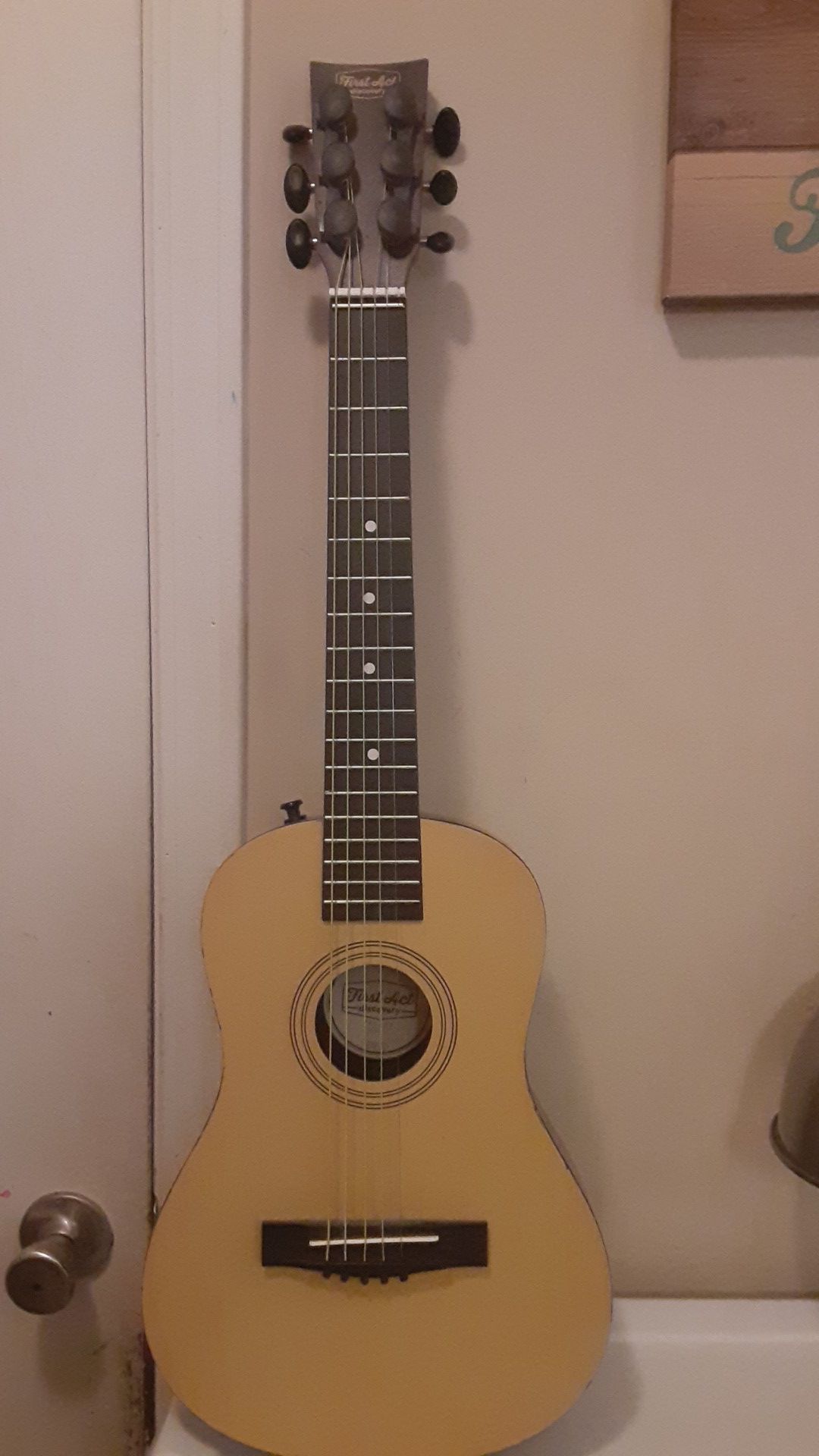First act discovery guitar