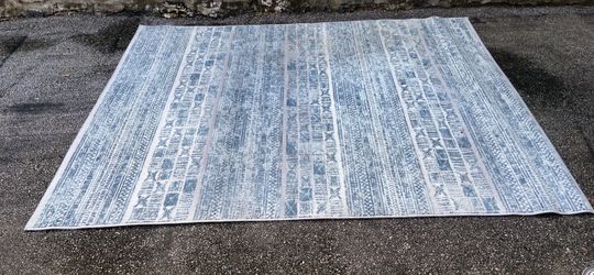 White and blue area rug