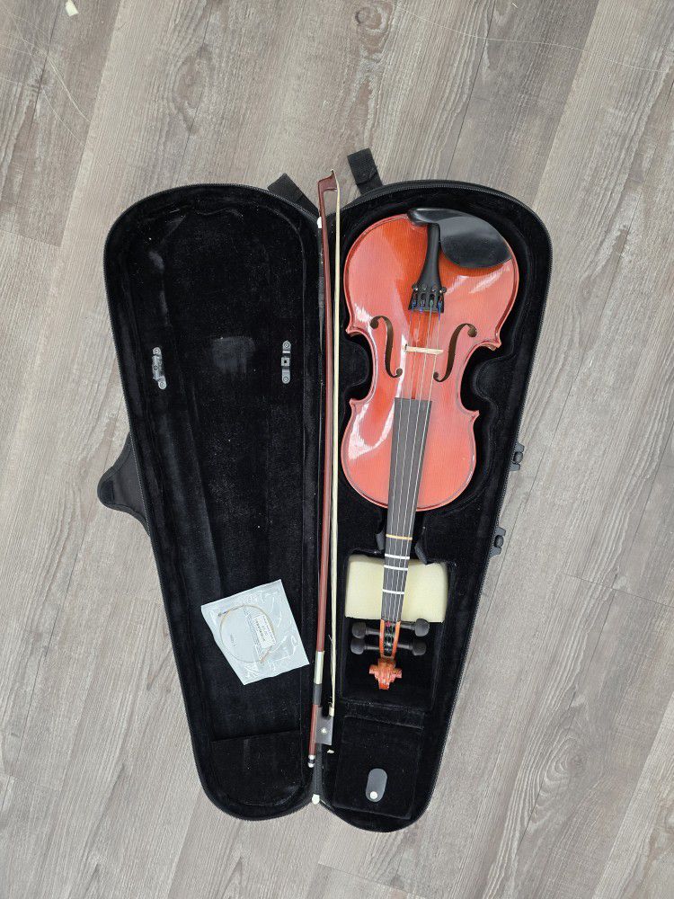 child's violin with carry case