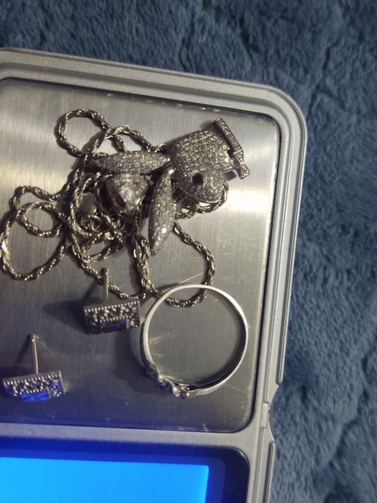 White Gold Necklace Is 14k. The Pendant The Earing And The Ring Is 10k Ring Is Size 7