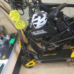 VSETT 10+ electric scooter features a distinctive yellow and black design with dual motors.
