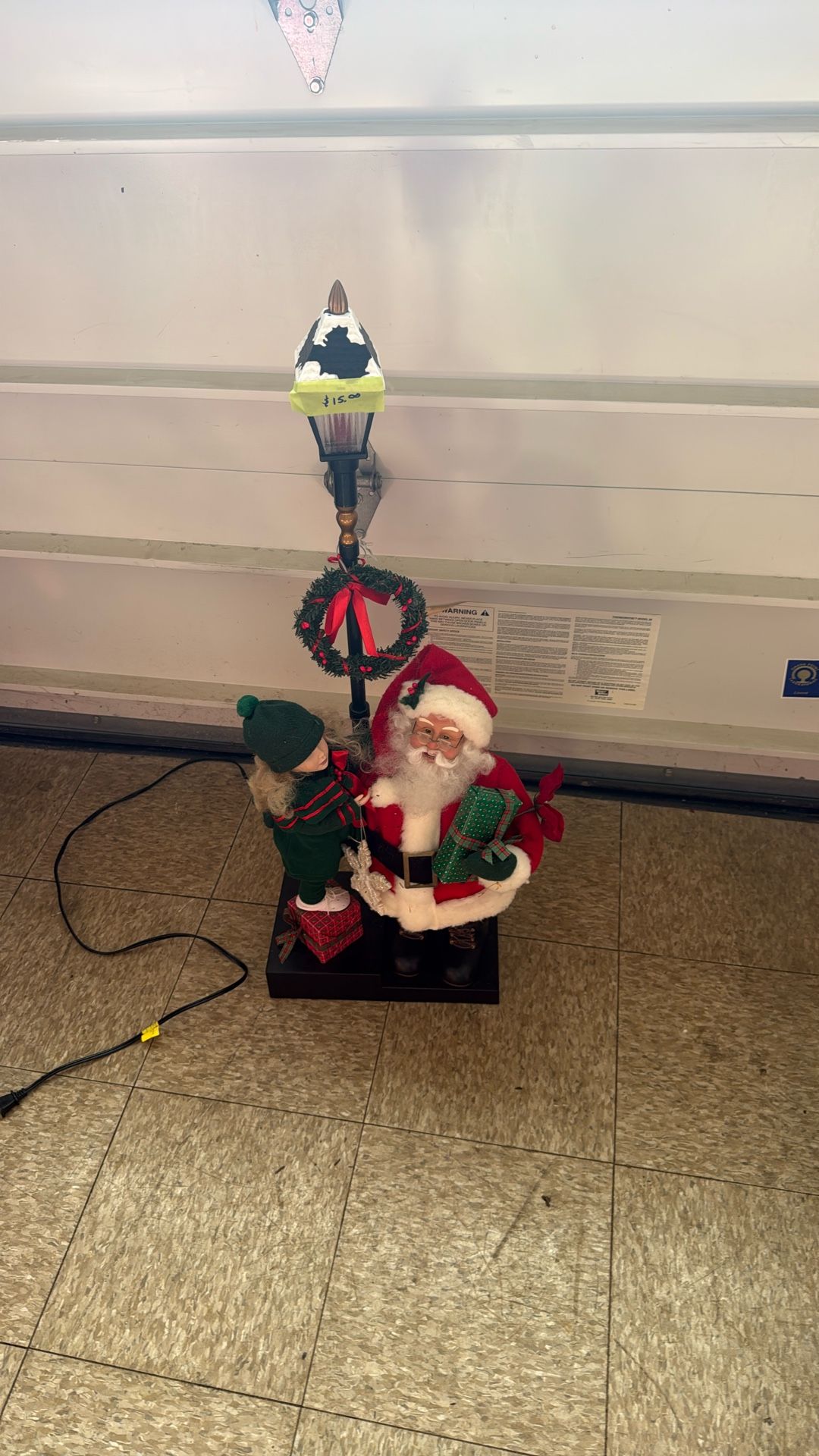 Santa Claus & Caroler Under Lamppost